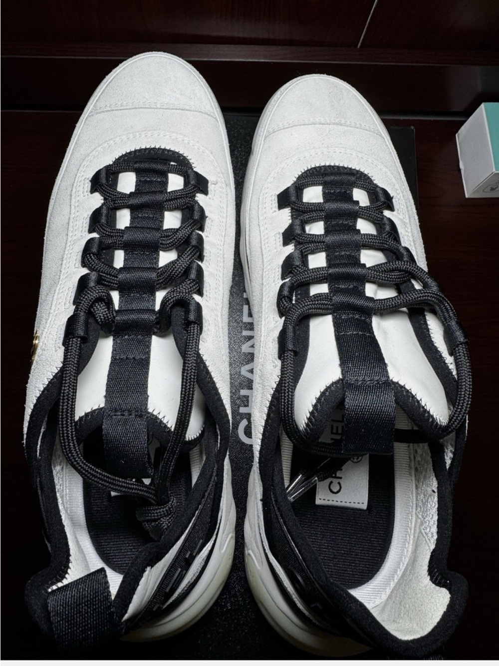 CHANEL Cream and Black Men's Quilted Sole Sneakers - Picture 2 of 8